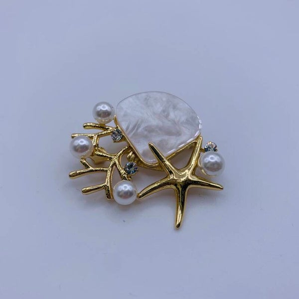 Broche Sea