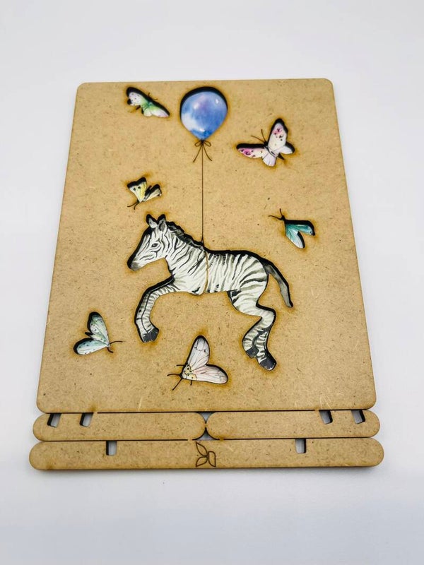 Wenskaart hout Komoni Amsterdam 'Geboorte blue balloon'