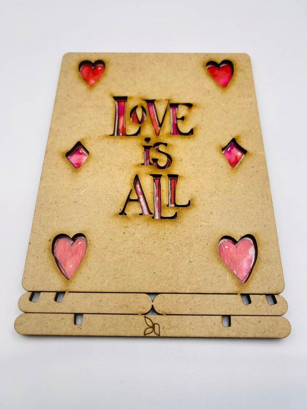 Wenskaart hout Komoni Amsterdam 'Love is All'