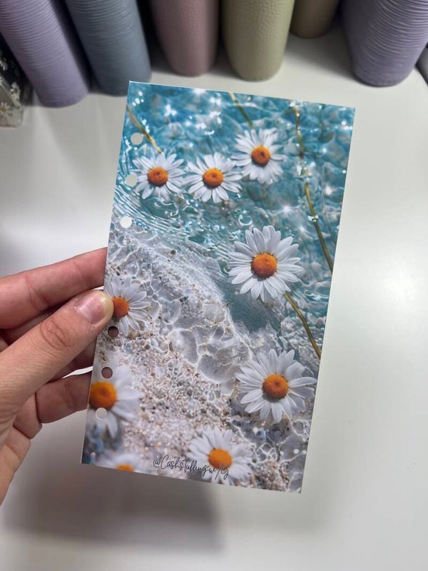 Copertina mare e margherite