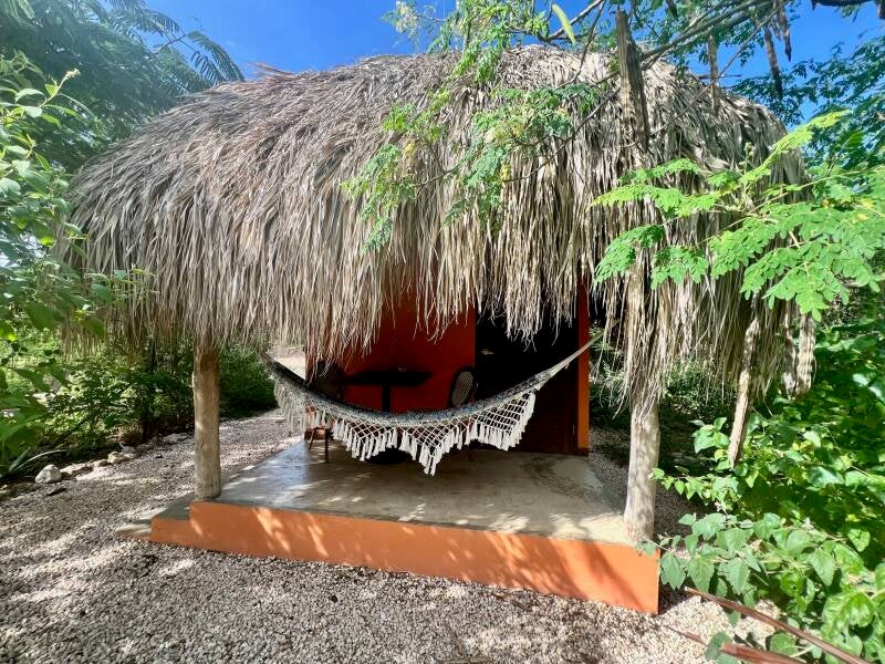 De Octopus Tropical Oasis Eco retreat Curaçao Tropical cabin Flamingo