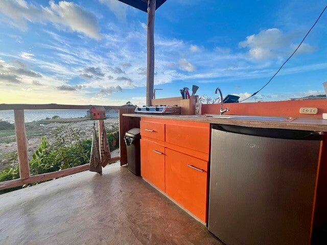 De Octopus Tropical Oasis Eco retreat Curaçao uitzicht appartement Prikichi