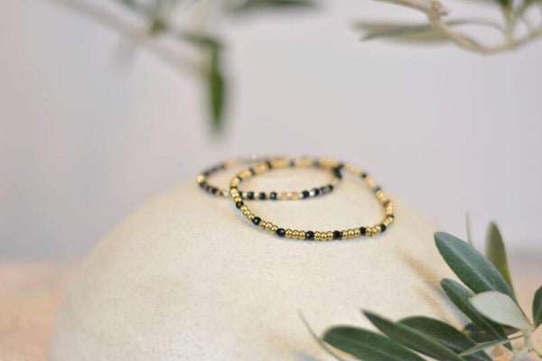 Perlenarmband Edelstahl schwarz-gold