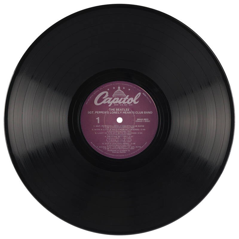 Beatles: McCartney, Harrison, and Starr Signed Album