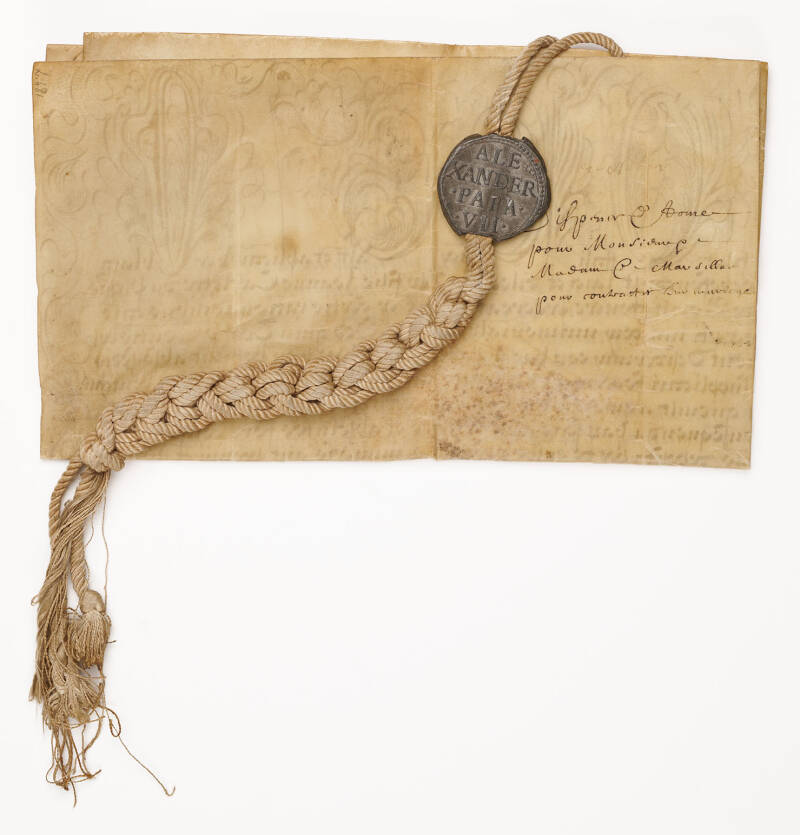 Vellum manuscript document issued under the auspices of Pope Alexander VII, in Latin, one page, 19.25 x 11.25, penned in a clerical hand, and carrying the leaden seal of Pope Alexander VII at the bottom