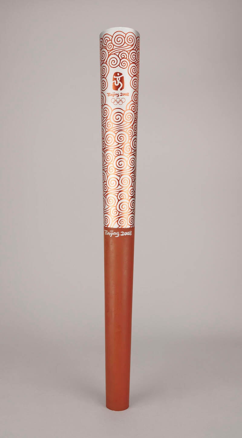 Official 2008 Beijing Summer Olympics torch, constructed of anodized aluminum and rubber, measuring 28.5″ in length and 3″ at its widest point