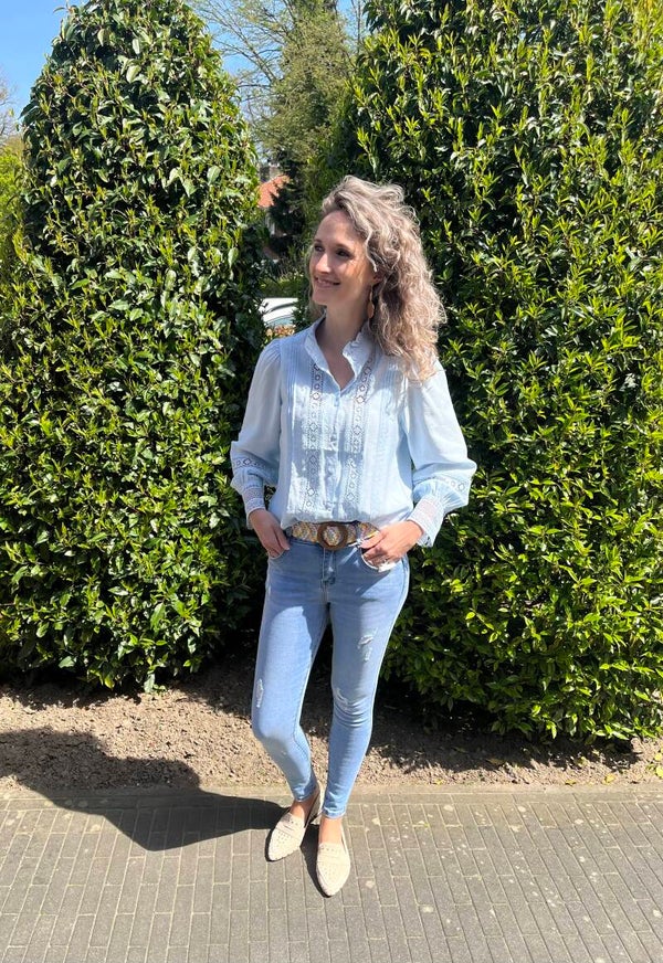 Licht blauwe blouse