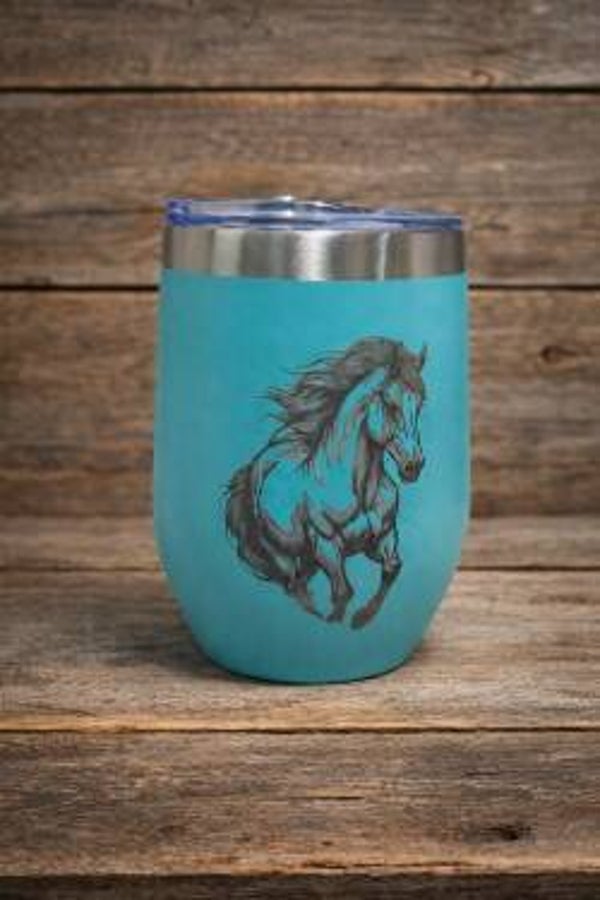 Eye catching Teal horse tumbler