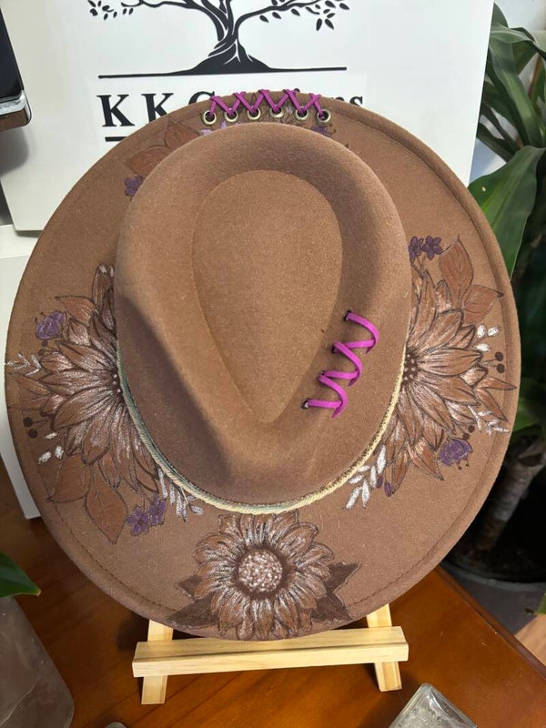 Stunning fedora hat has been, laser etched, hand burnt, painted and has lacing.  This is one of a kind.