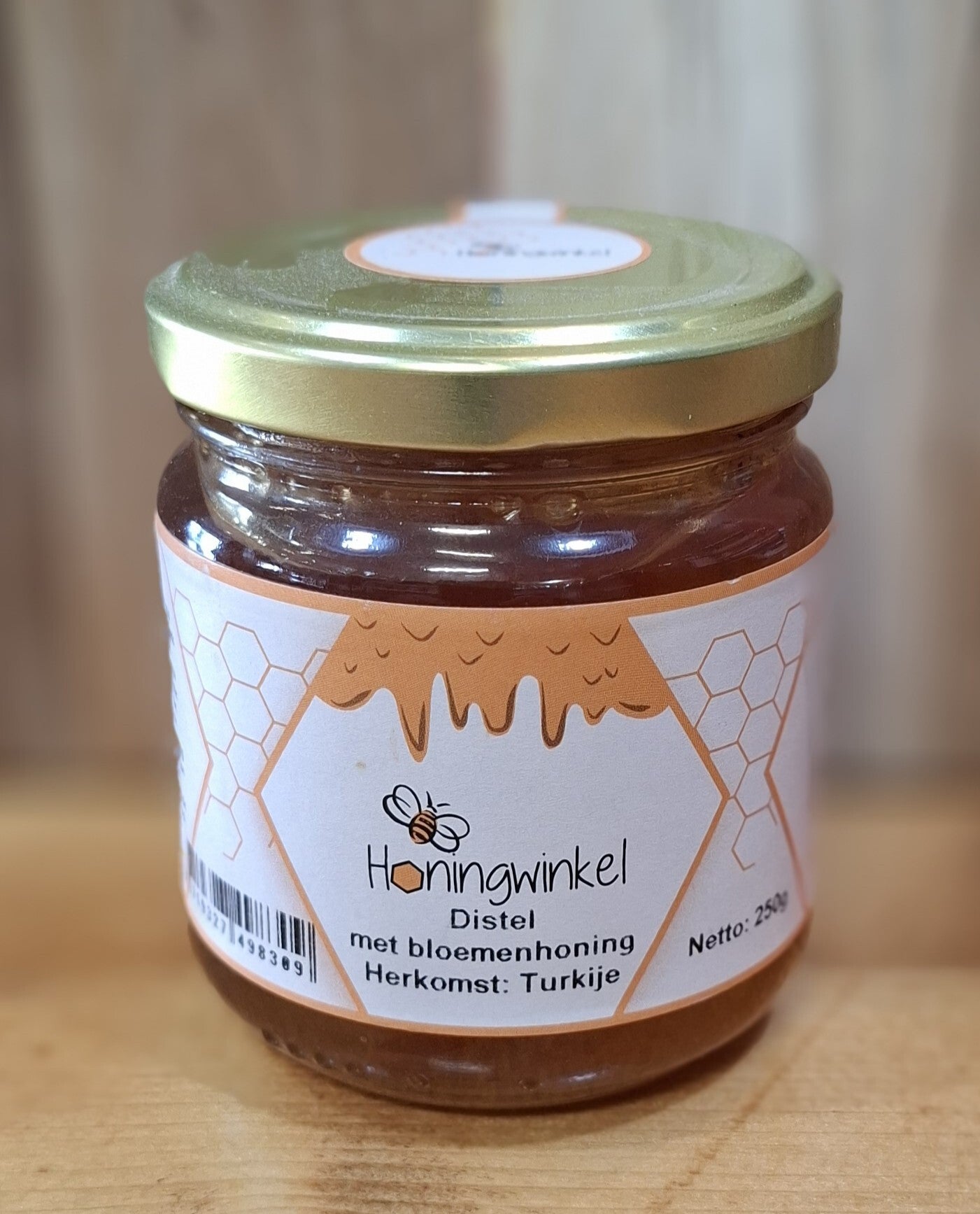 Distel met bloemenhoning.