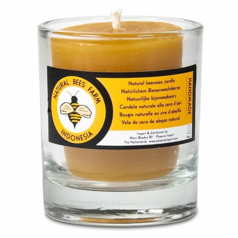 Votief kaarsje van bijenwas in glaasje.