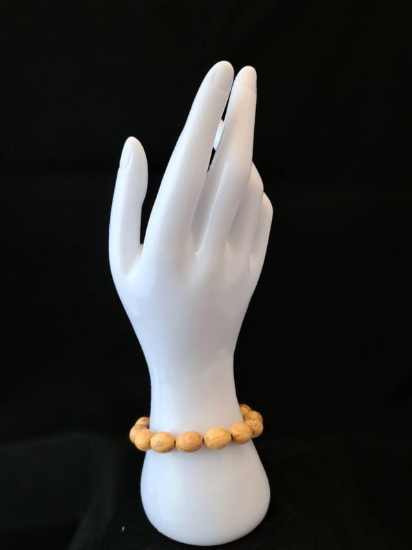 Palo Santo elastische armband met ovale kralen.