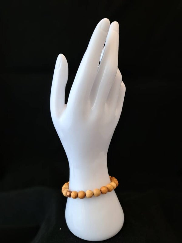 Palo Santo elastische armband met grote ronde kralen.