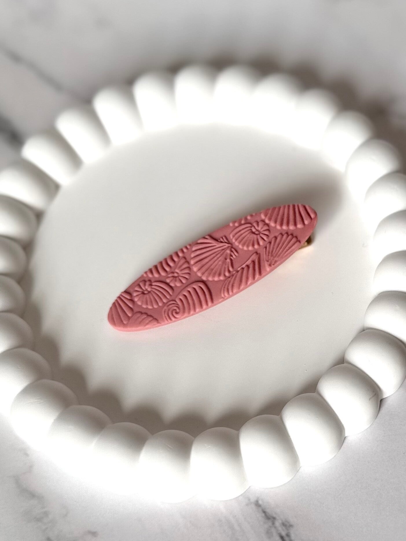 Haarspeld schelppatroon roze