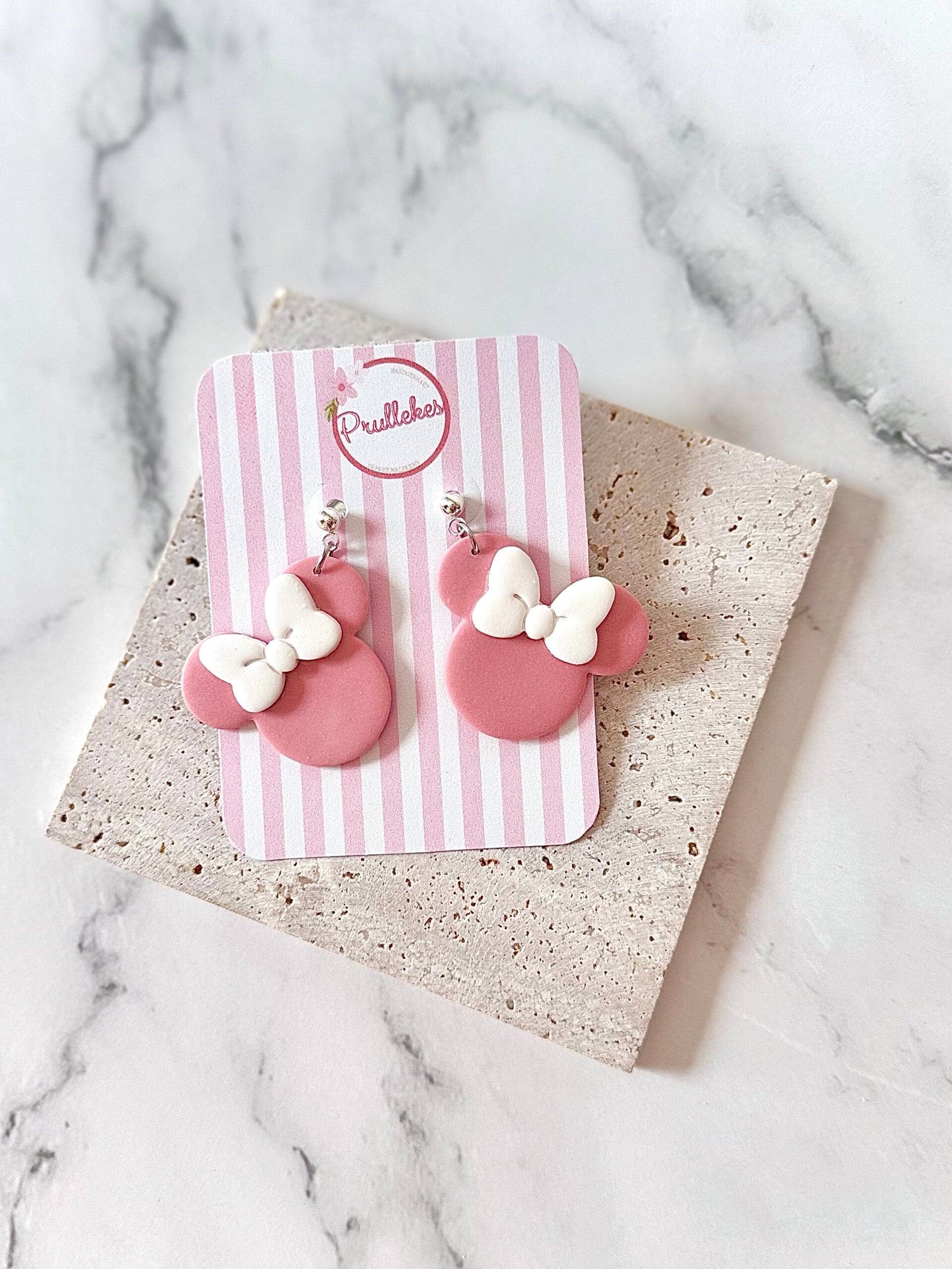 Minnie mouse roze + witte strik