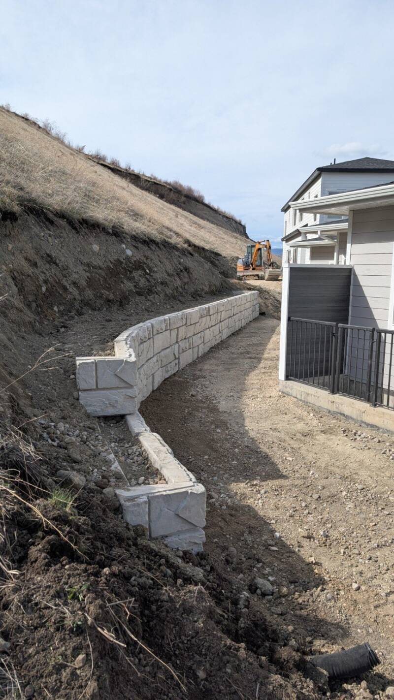 Curved retaining wall on a hillside (work in progress)
