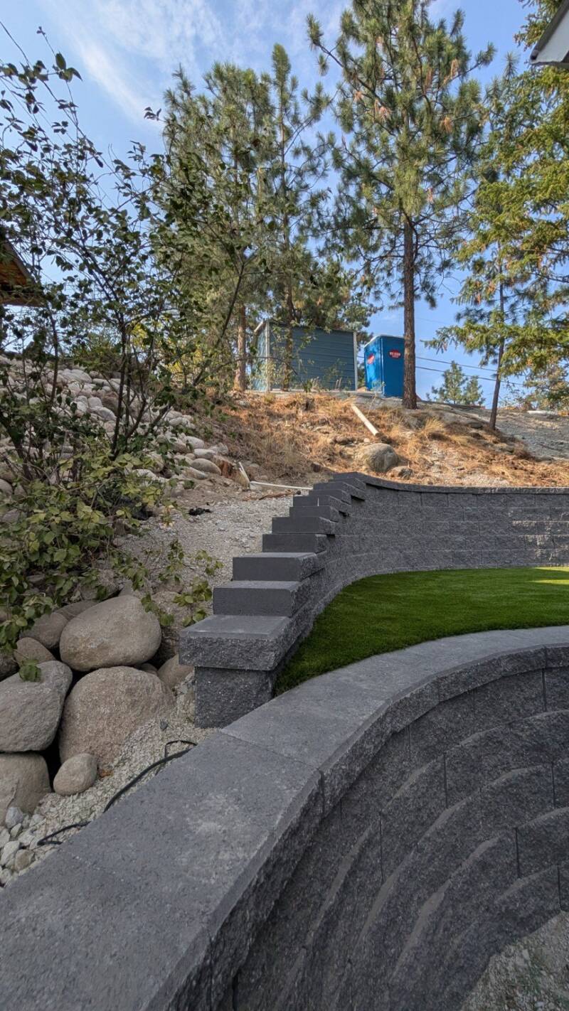 Curved block walls and hillside steps