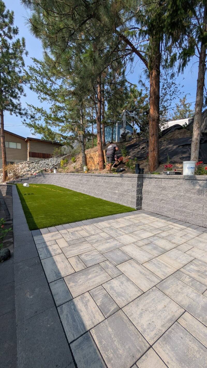 Paver courtyard and raised lawn