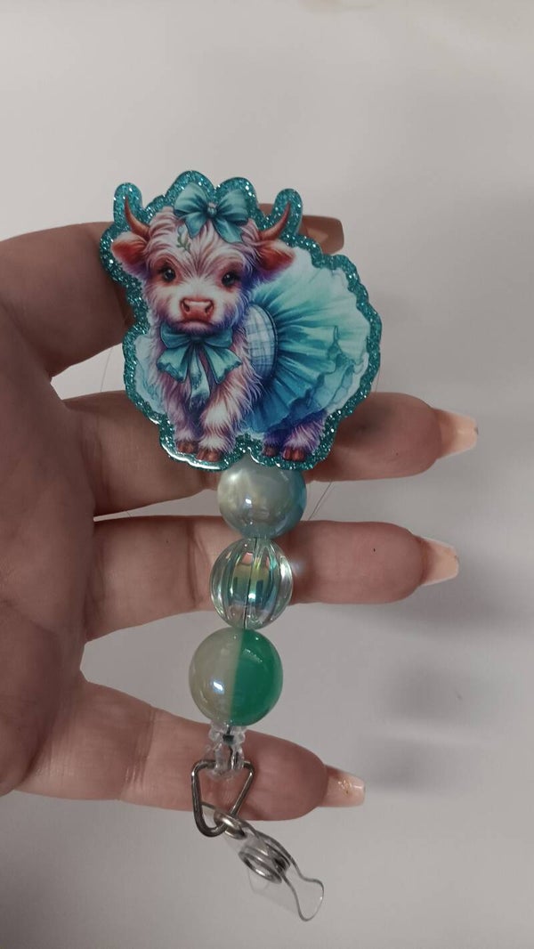tutu cow badge reel