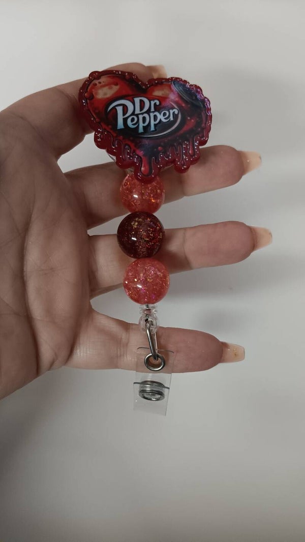 Dr. Pepper badge reel