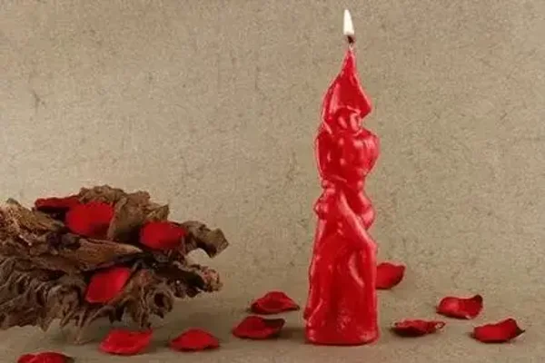 PAREJA UNIDA HOMBRE-MUJER DE CERA ROJA 20 cm (AMOR)