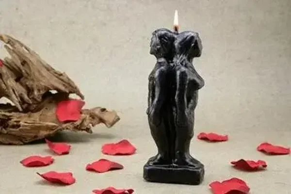 PAREJA UNIDA ESPALDA HOMBRE-MUJER DE CERA NEGRA (SEPARACION)