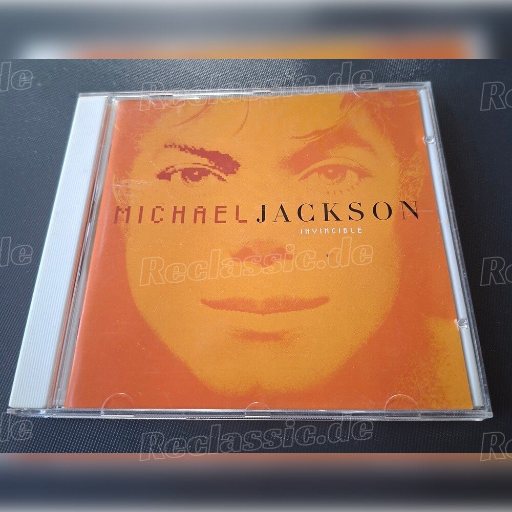 Michael Jackson- Invincible Orange Edition Artwork