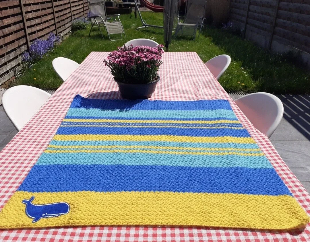 Koopjeshoek tassen en dekens.