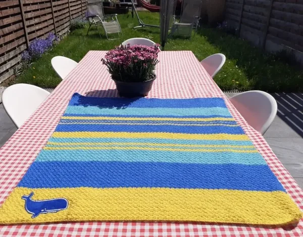 Koopjeshoek tassen en dekens.