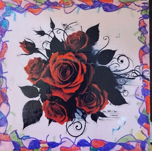 This is a box adorned with a beautiful rose.  It has hand-painted elements and holds greeting cards 