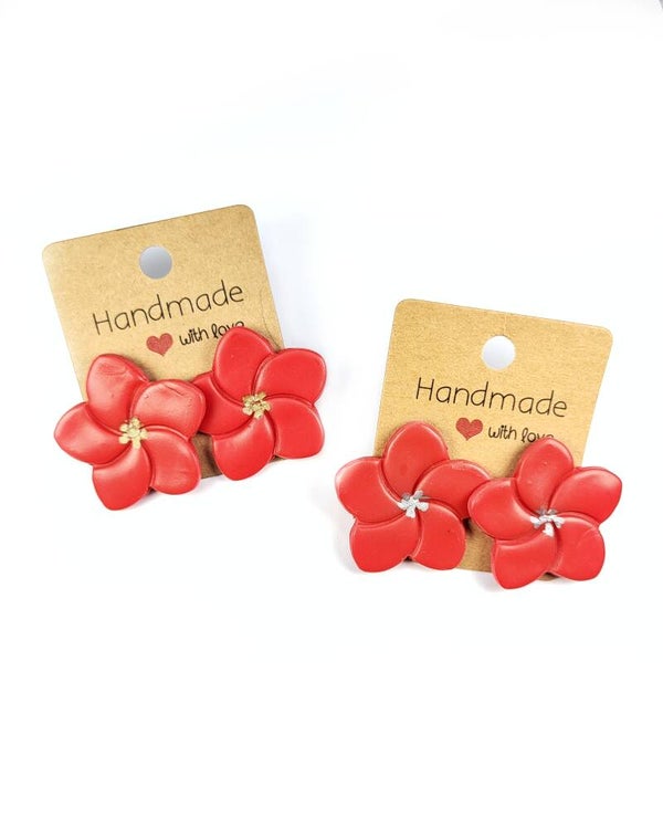Clous d'oreilles fleur rouge