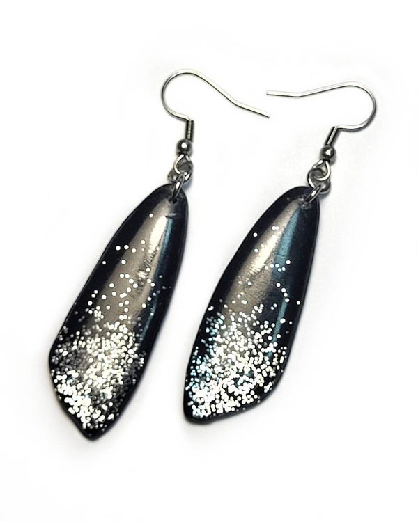 Boucles d'oreilles noires avec paillettes argentées