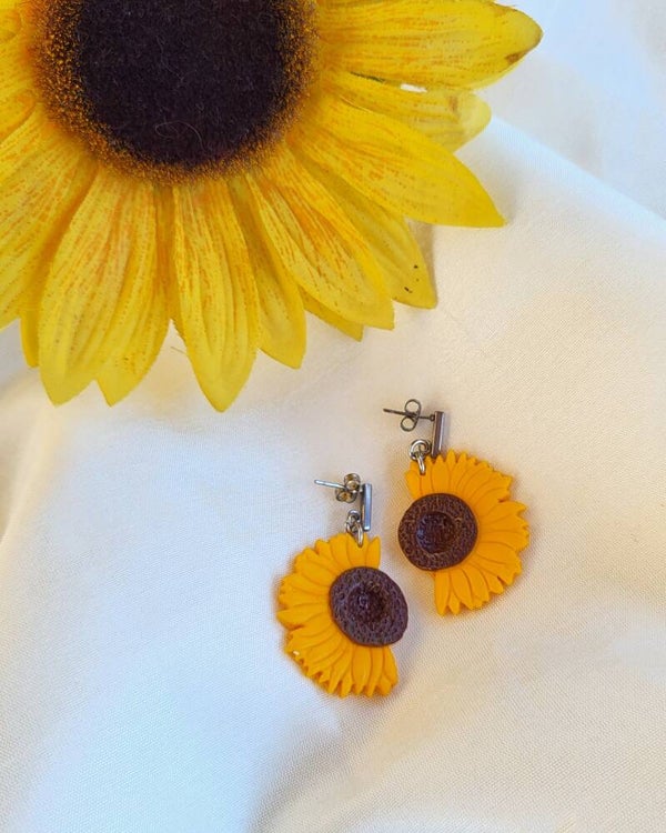 Clous d'oreilles pendants tournesol