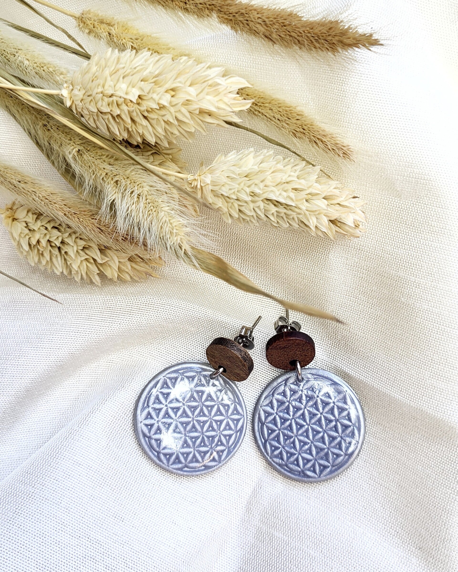 Clous d'oreilles fleur de vie