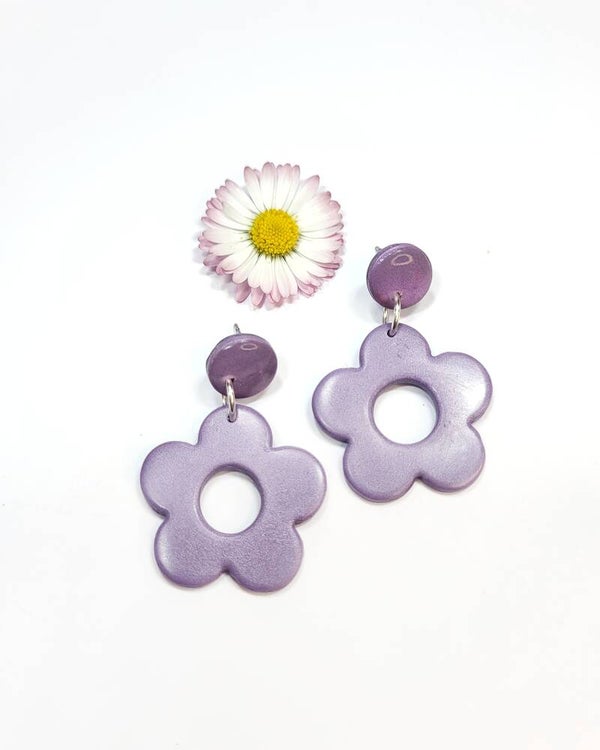 Clous d'oreilles pendants fleur