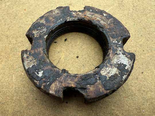 G102 Nut, lock transmission to transfer case drive gear