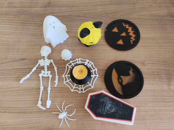 Zestaw dekoracji Halloween ozdoby klimatyczne (szkielet, duch, kociołek, trumna, podkładki)