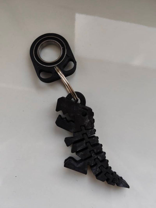 Brelok Antystresowy Dinozaur T-Rex z Łożyskiem (Spinner / Fidget Keychain)