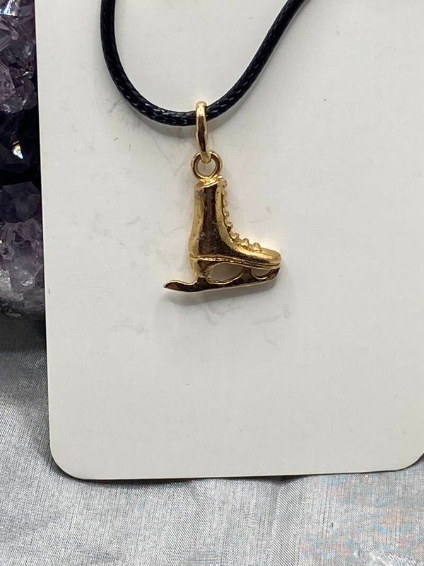 Collier et pendentif patin à glace en or