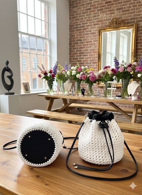 White and Black drawstring bag.