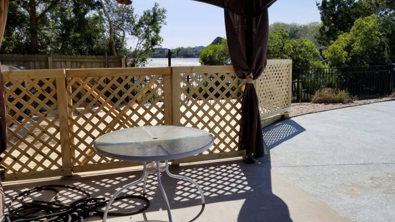 poolside deck and fence with automatic gate