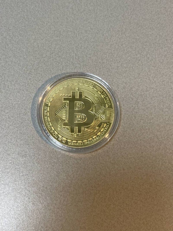 Bitcoin munt in capsule