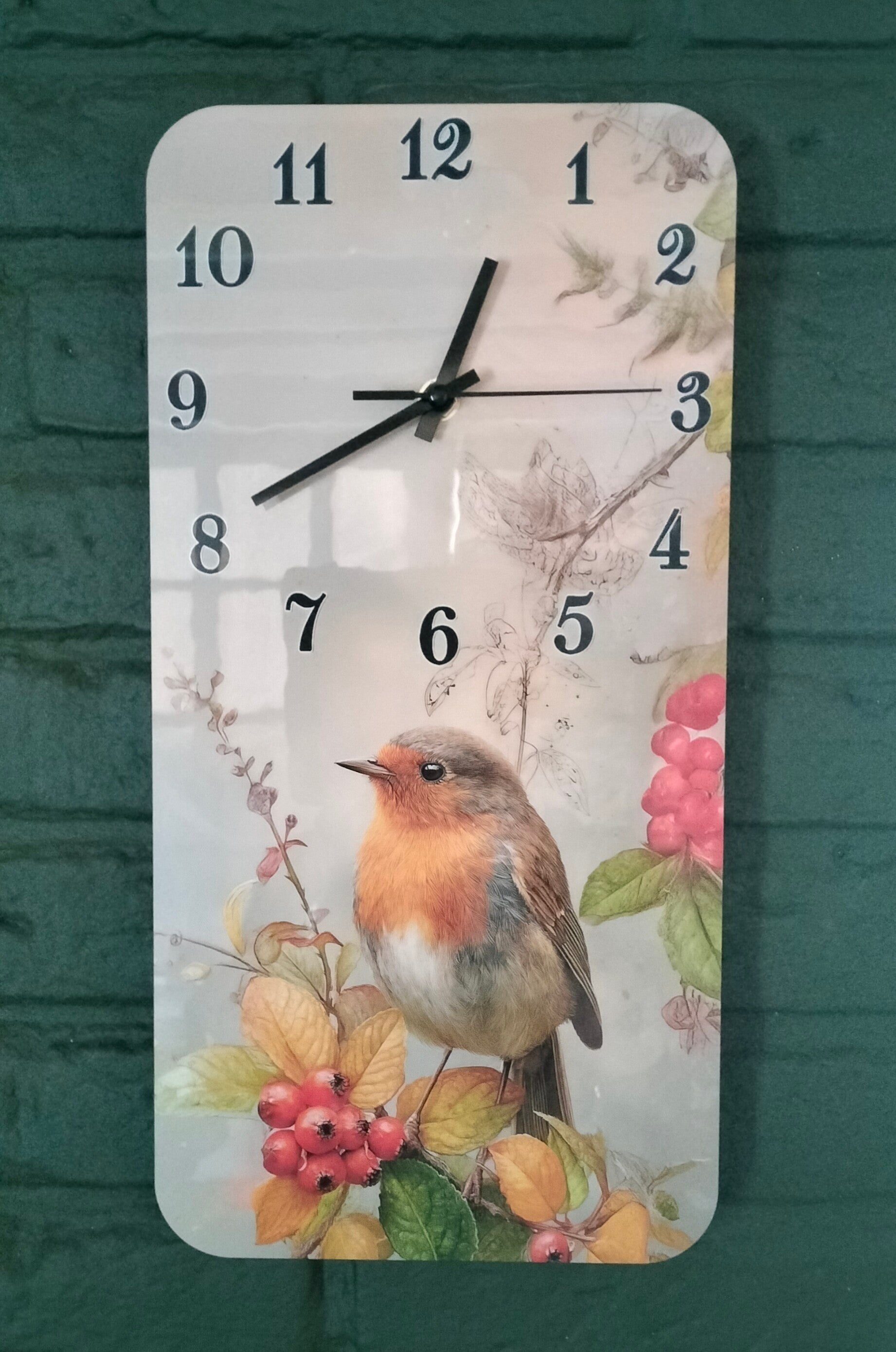 Wandklok met roodborstje