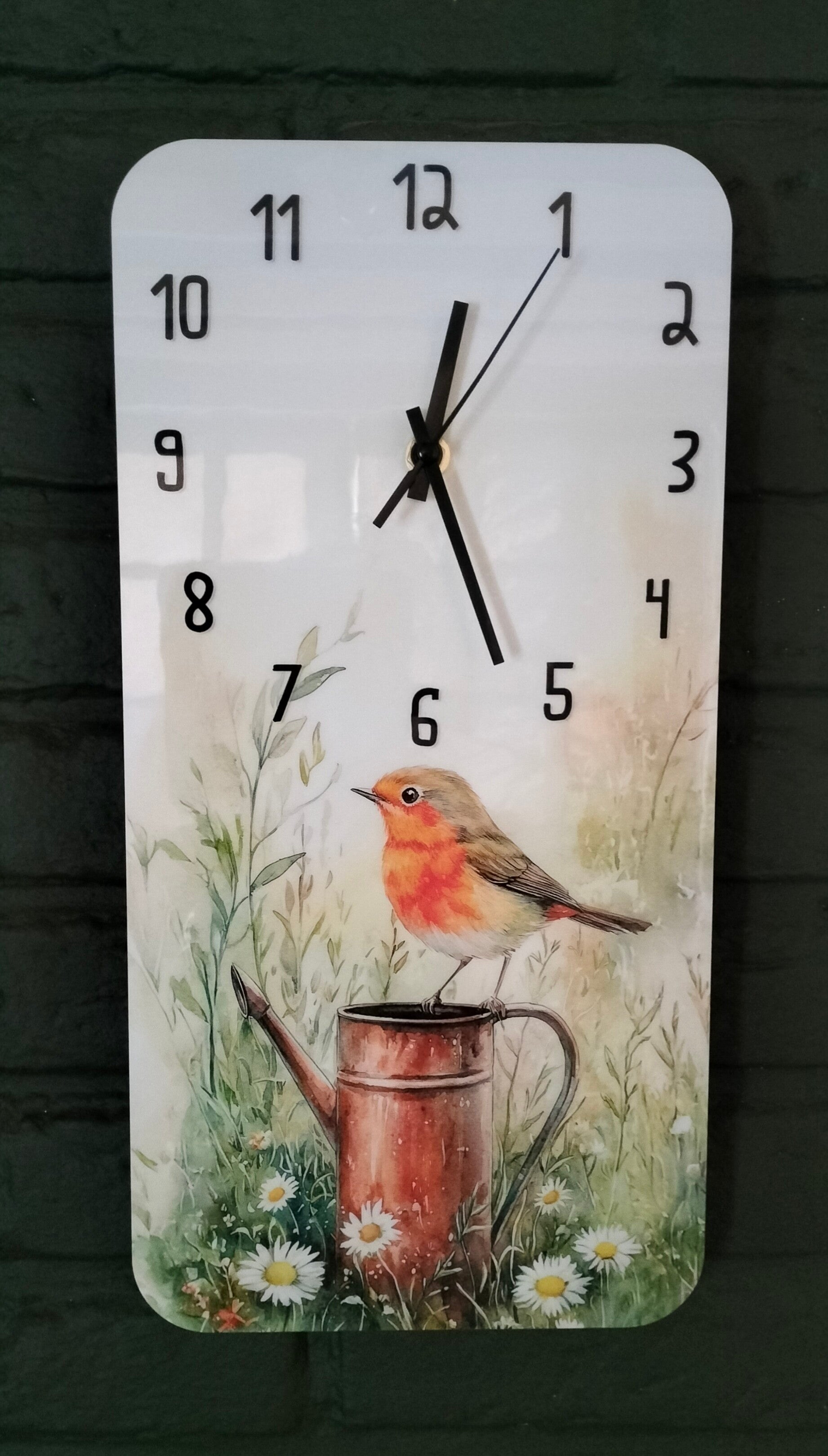 Wandklok met roodborstje