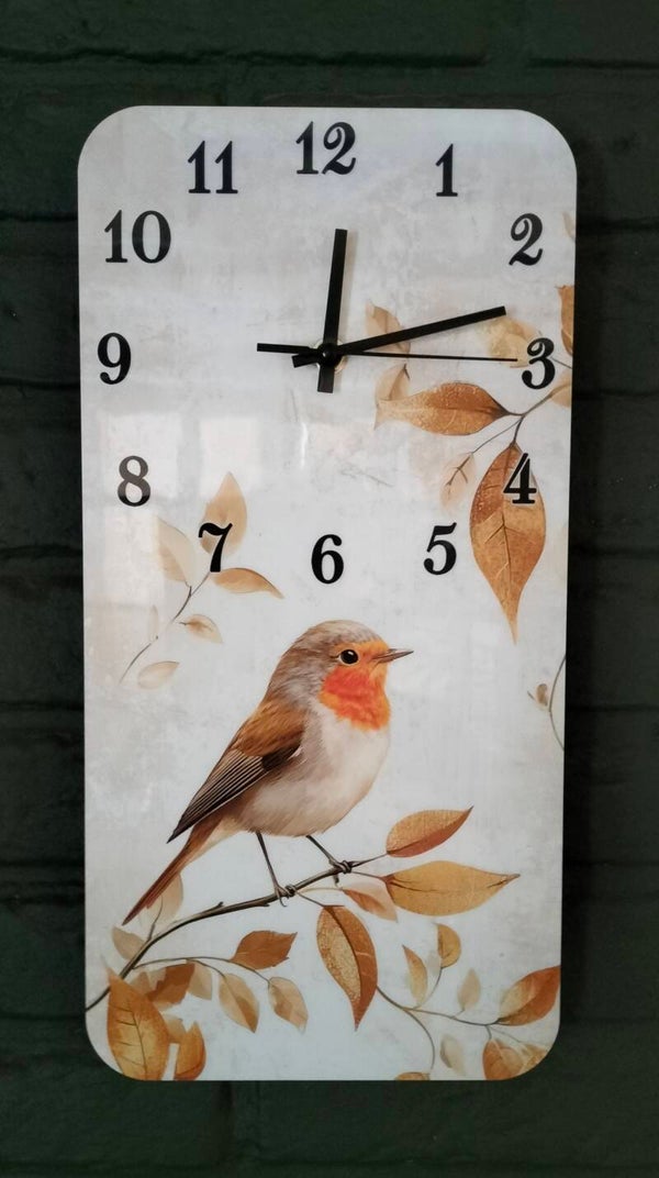 Wandklok met roodborstje