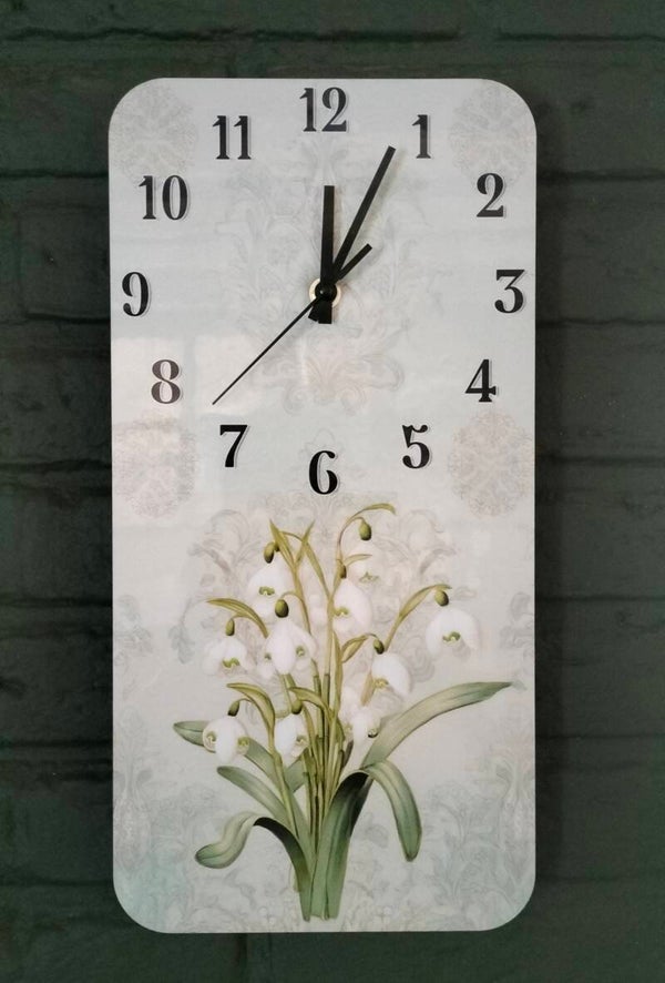 Wandklok met sneeuwklokjes