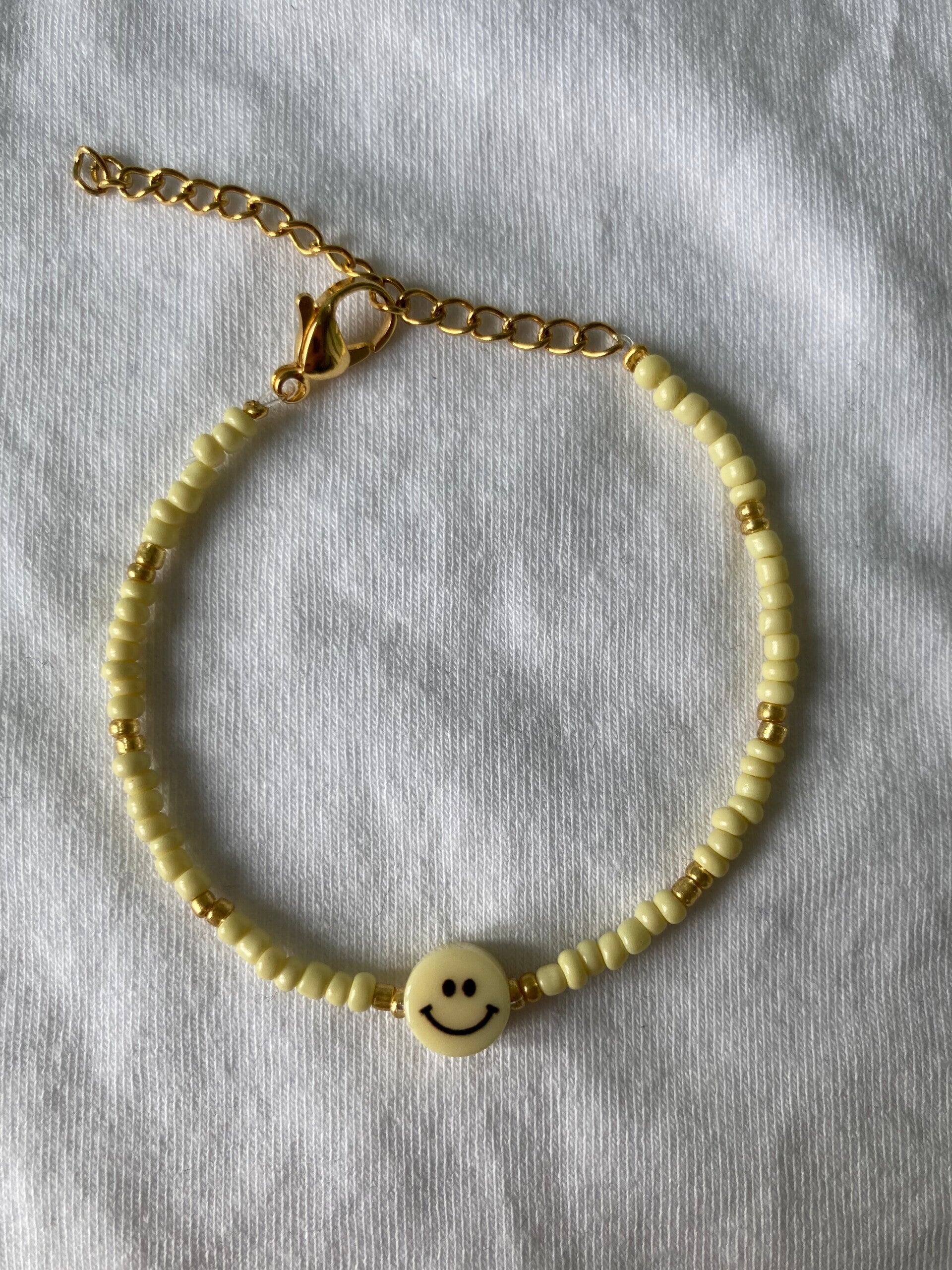 Smiley armbandje yellow