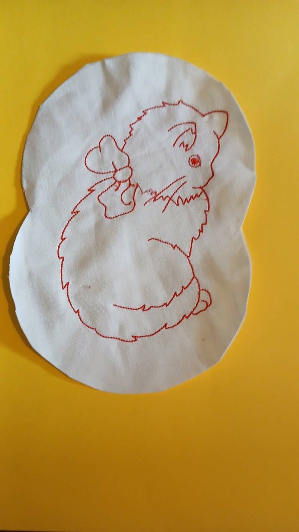 Motif broderie serviette de bain