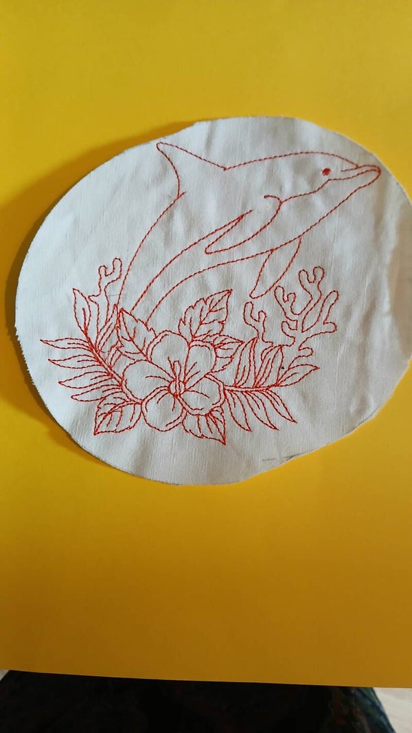 Motif broderie serviette de bain