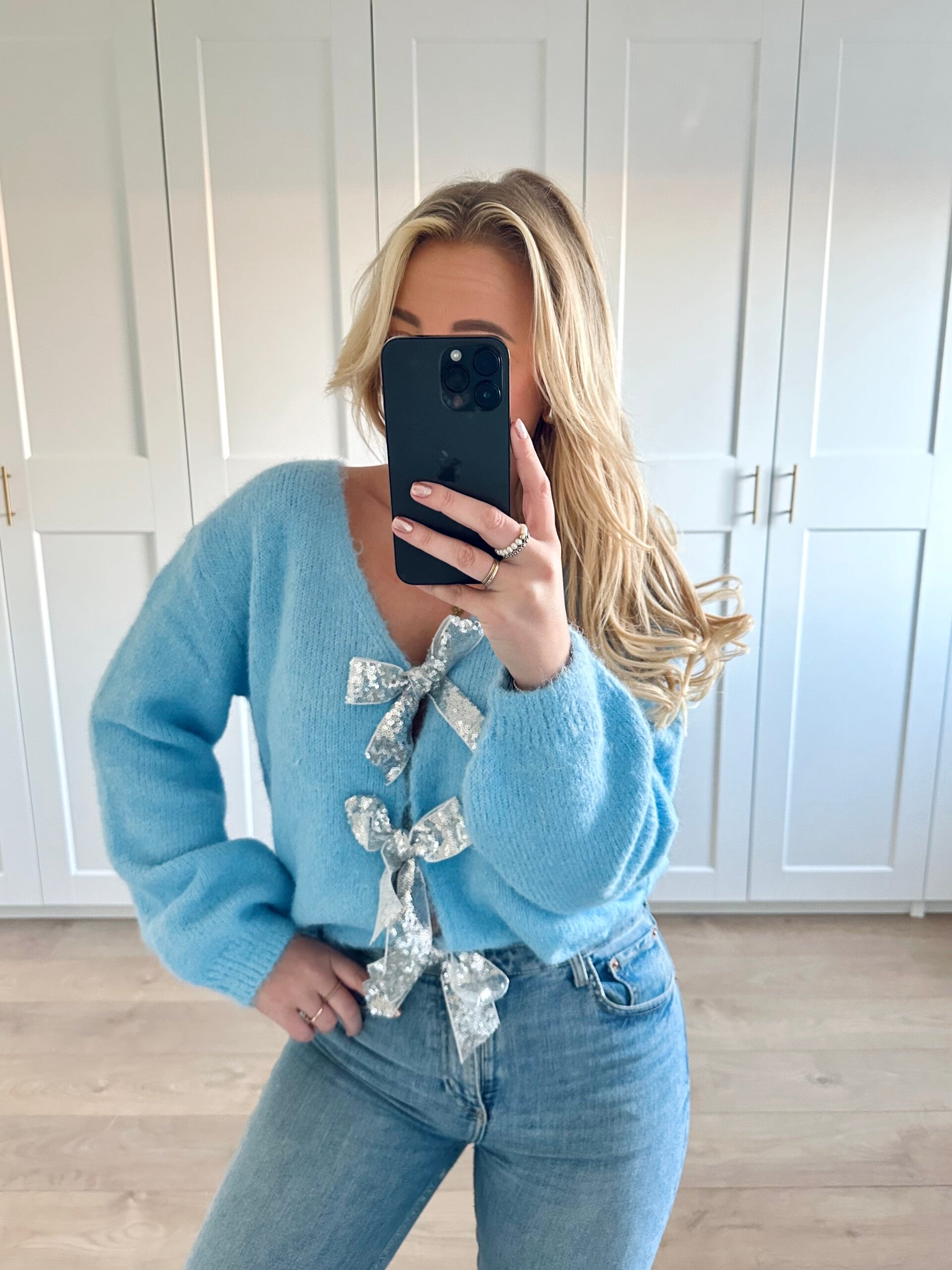 Trui met zilveren strikken - blauw